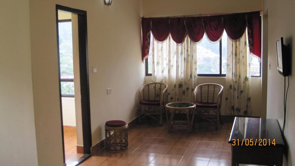 Poopada Hotel Munnar Kamer foto