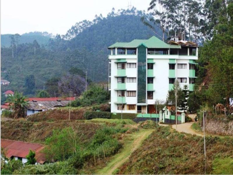 Poopada Hotel Munnar Buitenkant foto