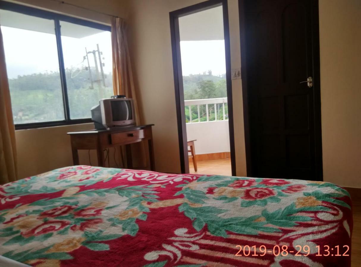 Poopada Hotel Munnar Buitenkant foto